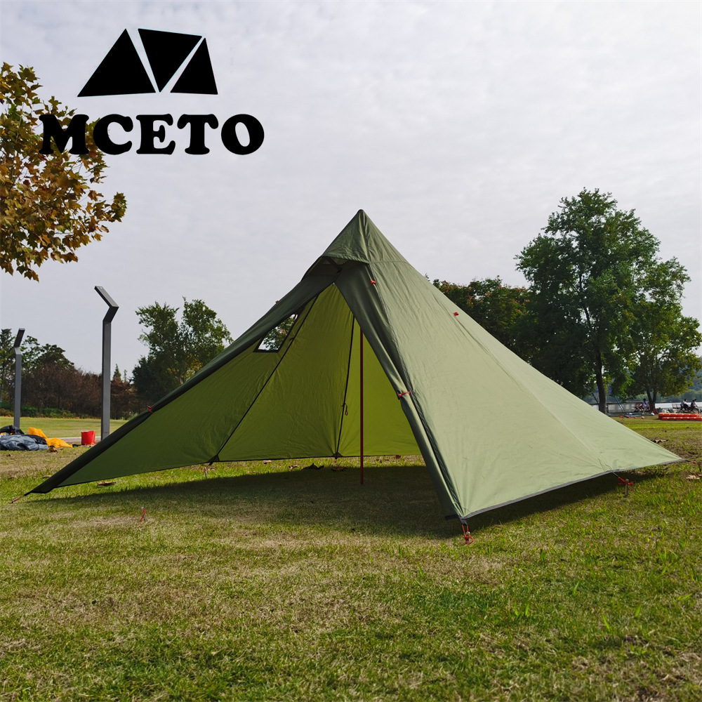 四隅に煙突が付いたキャンプ用薪ストーブ付きピラミッド型保温テ - Camping Quad のレビューと価格